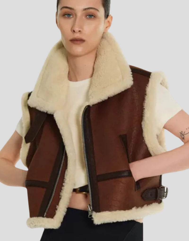 Front view of Dakota Premium Sheepskin Shearling Vest - Brown leather vest with faux shearling lining, zippered front, and stylish buckle details.