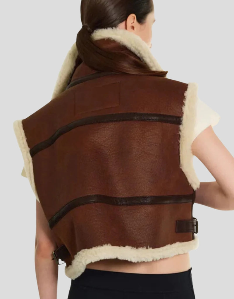 Back view of Dakota Premium Sheepskin Shearling Vest - Brown leather vest with creamy shearling trim and buckle detailing.