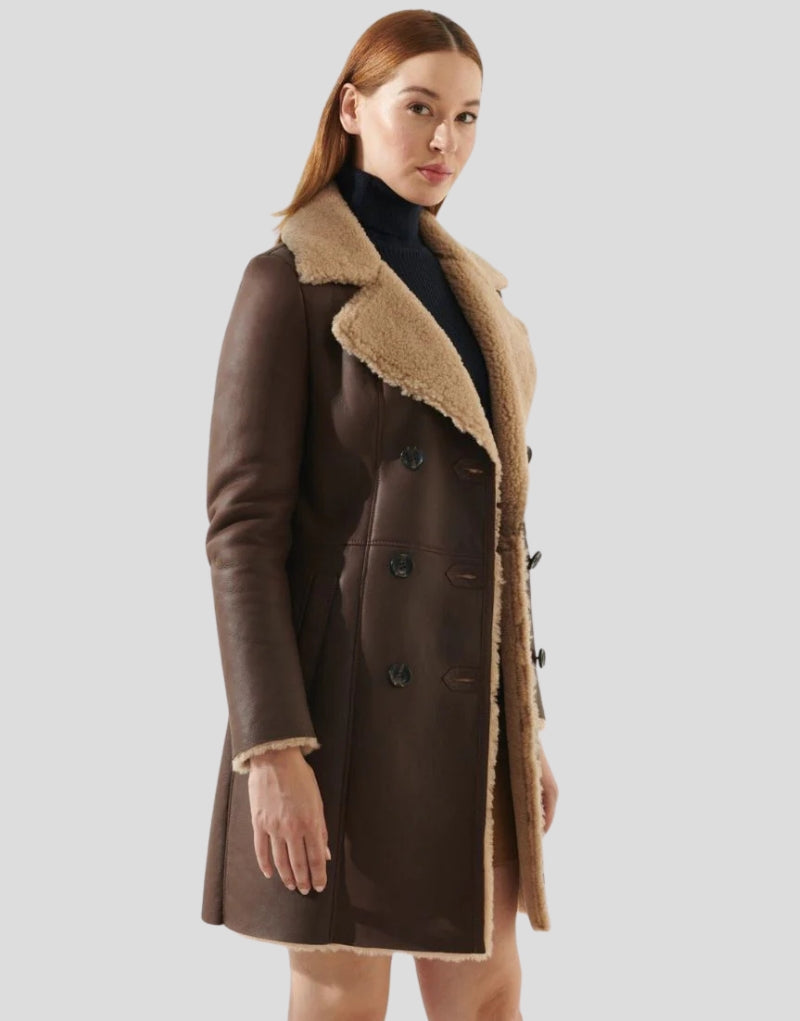 Warm brown leather coat with shearling