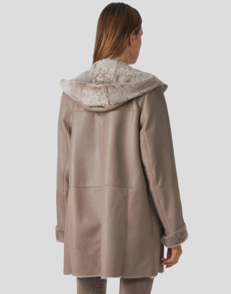 Back view of Ava Sheepskin Leather Shearling Coat showcasing soft leather and hood